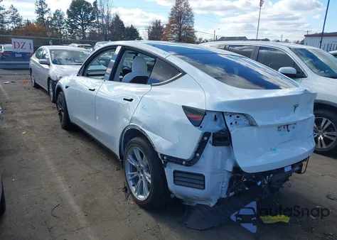 2022 Tesla Model Y Long Range Dual Motor All-Wheel Drive from USA, damaged, VIN 7SAYGAEE7NF391250